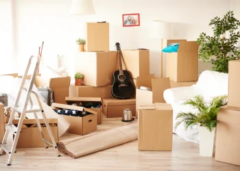 top-view-messy-full-moving-boxes-room_329181-18268